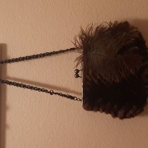 Chico’s Faux fur with feather clutch with strap